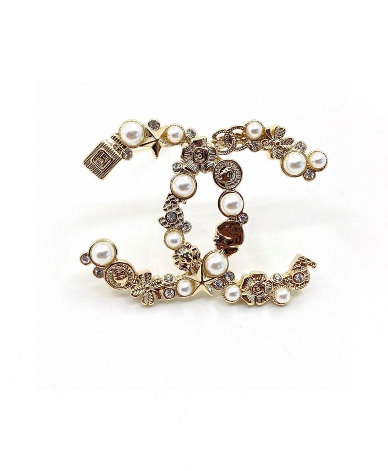 Ch**el brooches
